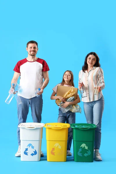 Family Sorting Garbage Recycle Bins Blue Background — Stock Photo, Image