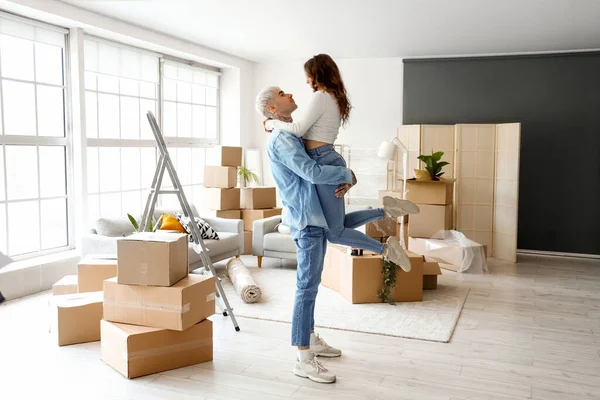 stock image Happy young couple in room on moving day