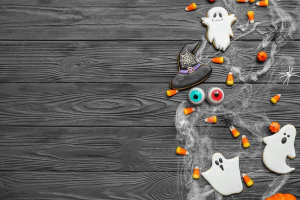 Composition Tasty Halloween Candy Corns Cookies Dark Wooden Background — Stock Photo, Image