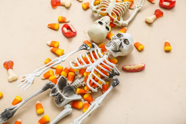 Tasty Halloween Candy Corns Skeletons Beige Background Closeup — Stock Photo, Image