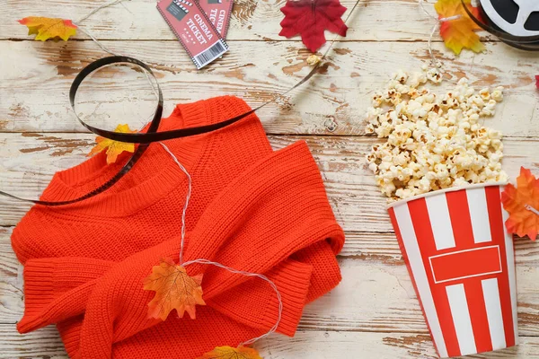 Composition Tasty Popcorn Film Reel Sweater Cinema Tickets Light Wooden — Stock Photo, Image