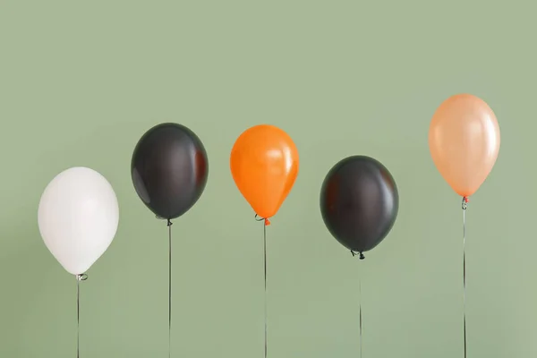 Different Halloween Balloons Green Background — Stock Photo, Image