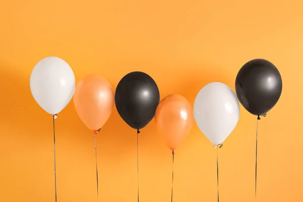 Different Halloween Balloons Orange Background — Stock Photo, Image