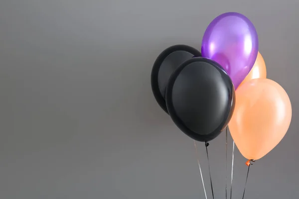 Different Halloween Balloons Grey Background — Stock Photo, Image