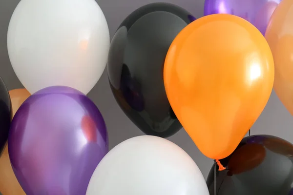 Different Halloween Balloons Grey Background Closeup — Stock Photo, Image