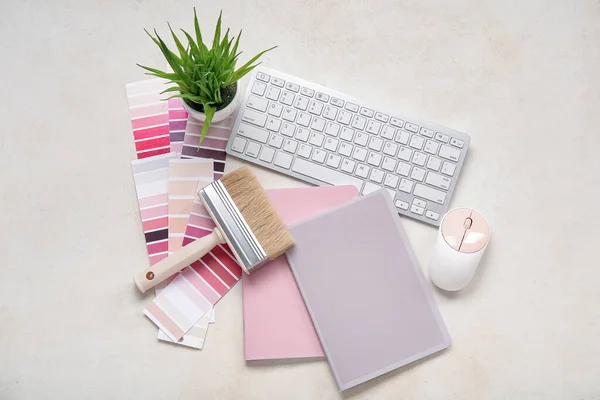 Many Color Palettes Keyboard Brush Notebooks Light Background Top View — Stock Photo, Image