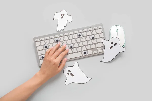 Female Hand Modern Computer Keyboard Mouse Paper Ghosts Halloween Grey — Stock Photo, Image