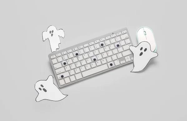 Composition Modern Computer Keyboard Mouse Paper Ghosts Halloween Grey Background — Stock Photo, Image