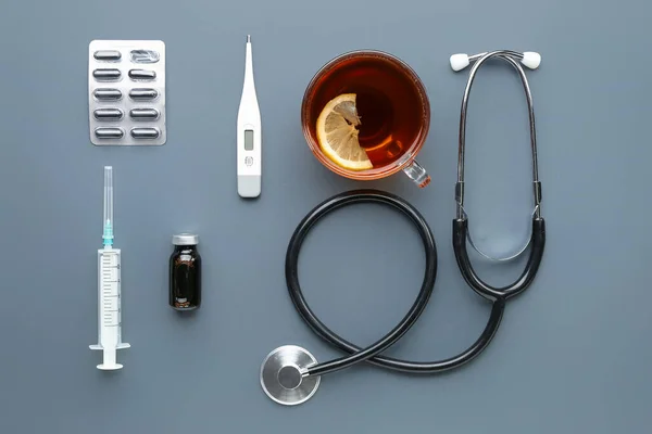 Stethoscope Cup Tea Pills Grey Background — Stock Photo, Image