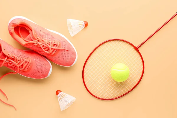 Stylish Sneakers Tennis Racket Ball Shuttlecocks Color Background — Stock Photo, Image
