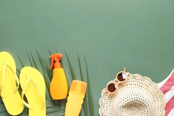 Set Beach Accessories Sunscreen Cream Palm Leaf Green Background — Stock Photo, Image