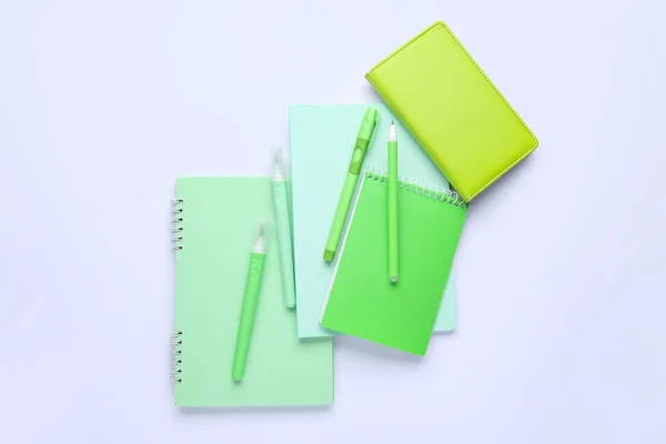 Composición Con Diferentes Cuadernos Bolígrafos Marcadores Sobre Fondo Blanco —  Fotos de Stock