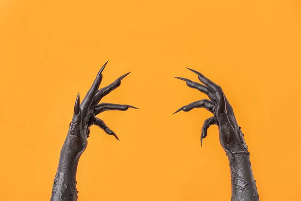 Zwarte Handen Van Heks Oranje Achtergrond Halloween Viering — Stockfoto