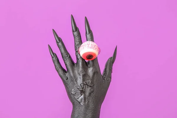 Fekete Boszorkány Kéz Lila Háttérrel Közelről Halloween Ünnepe — Stock Fotó