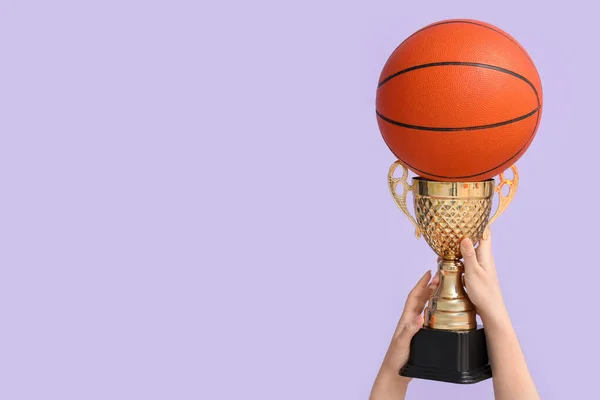 Female Hands Gold Cup Basketball Lilac Background — Stock Photo, Image