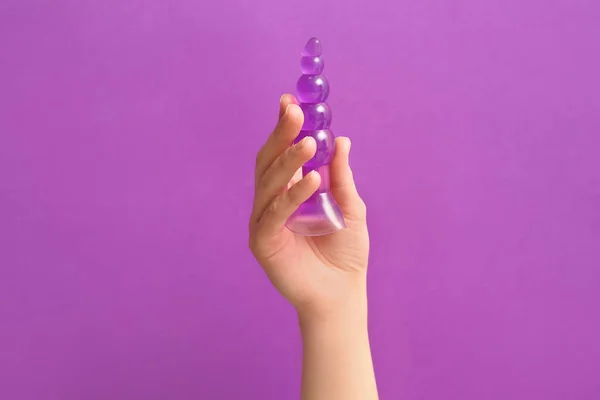 stock image Woman with anal plug on purple background