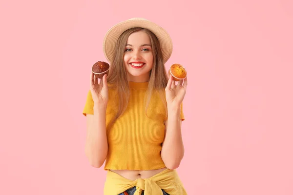 Young Woman Hat Tasty Muffins Pink Background — Zdjęcie stockowe