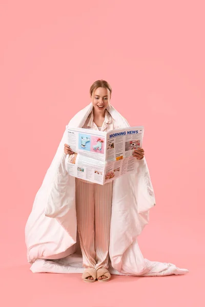 Young Woman Pajamas Reading Newspaper Pink Background — Stock Photo, Image