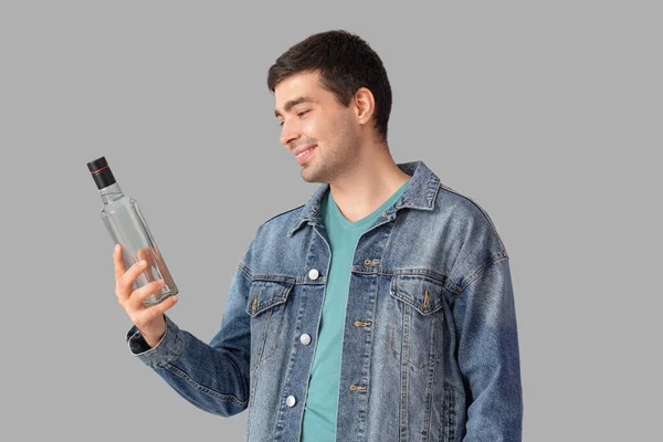 Young Man Bottle Vodka Light Background — Stock Photo, Image