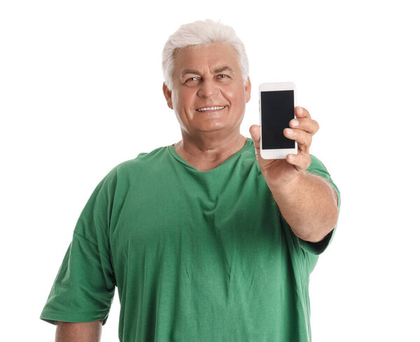 Senior man with mobile phone on white background