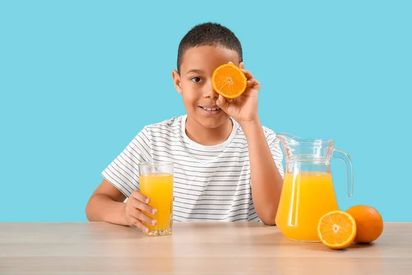 Little African American Boy Glass Orange Juice Table Blue Background — Stock Photo, Image