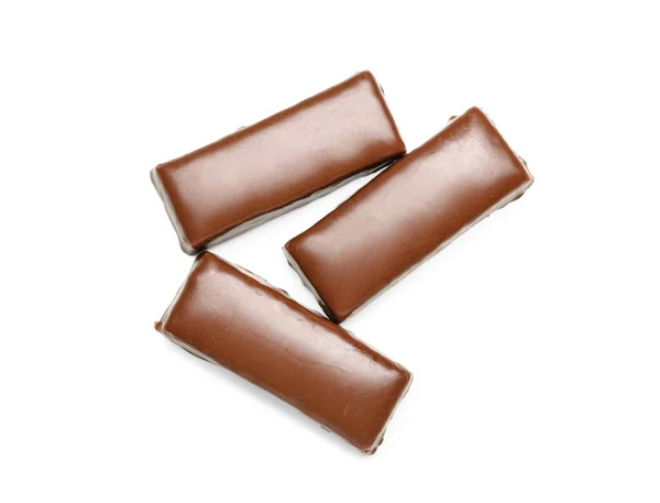 おいしいチョコレートは白い背景にココナッツキャンディーを覆いました — ストック写真