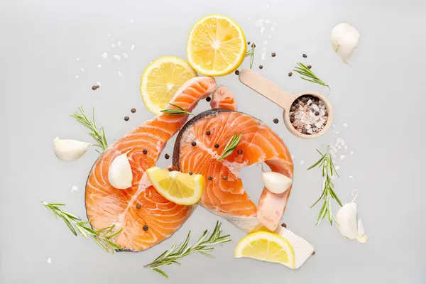 Flying Raw Salmon Steaks Different Spices Grey Background — Stock Photo, Image