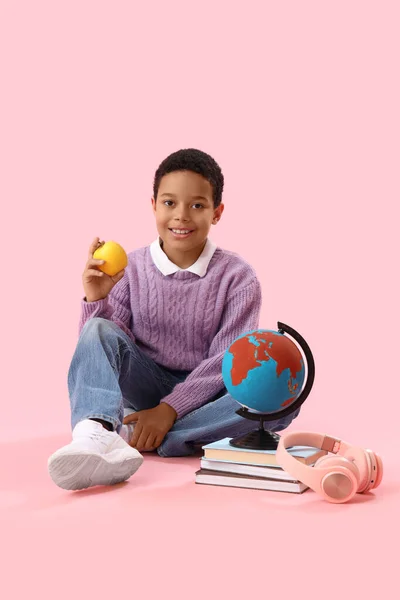 Little African American Schoolboy Globe Books Apple Pink Background — Stock Photo, Image