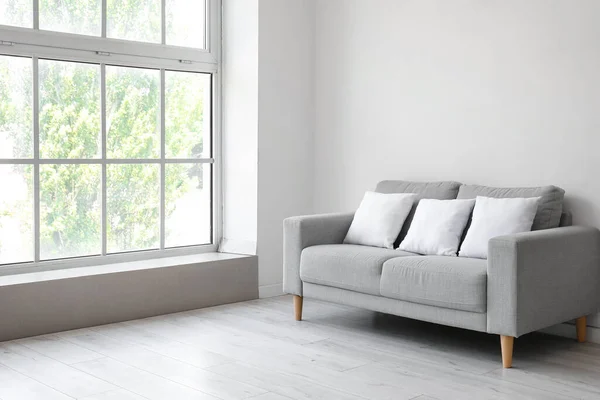 Grey Sofa Pillows White Wall — Stock Photo, Image