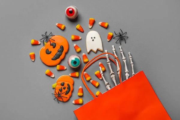 Shopping Bag Tasty Candy Corns Cookies Halloween Skeleton Hand Grey — Stock Photo, Image