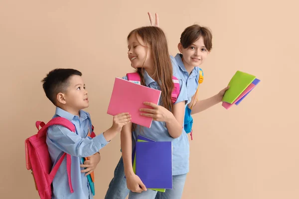 Little Pupils Copybooks Beige Background — Stock Photo, Image