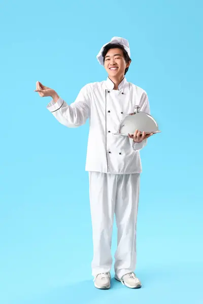 Male Asian Chef Cloche Gesturing Blue Background — Stock Photo, Image