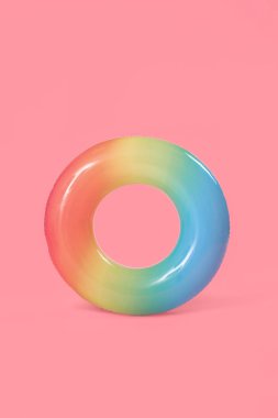 Inflatable ring on pink background