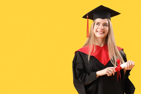 Female Graduate Student Diploma Yellow Background — Stock Photo, Image