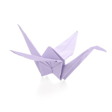 Origami kraan op witte achtergrond