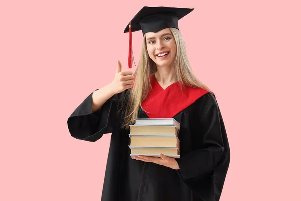 Female Graduate Student Books Showing Thumb Pink Background — Stock Photo, Image