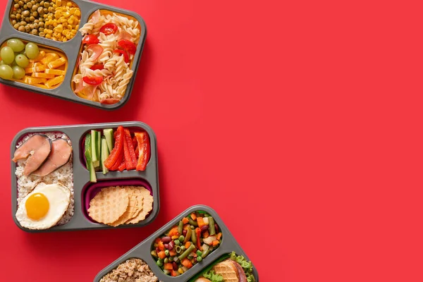 Lunchboxes Different Delicious Food Red Background — Stock Photo, Image