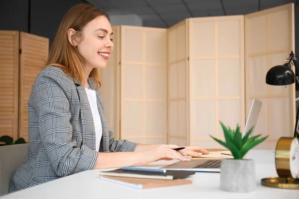 stock image Young woman having job interview online at home