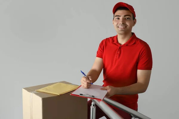 Male Courier Clipboard Stairway — Stock Photo, Image