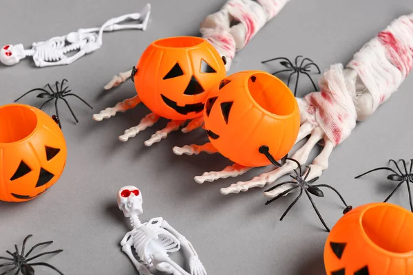 Skeleton Hands Pumpkins Spiders Halloween Celebration Grey Background Closeup — Stock Photo, Image