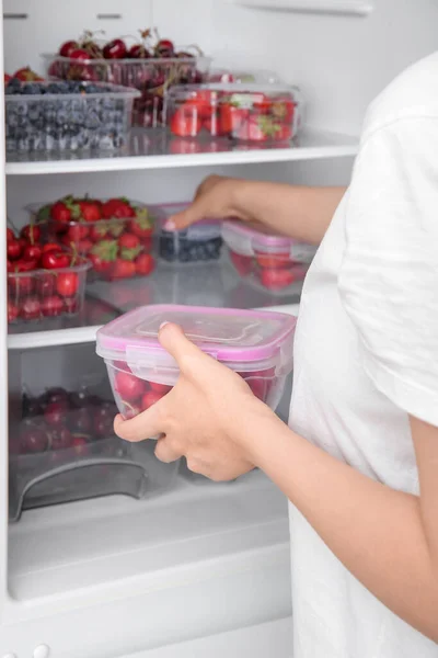 Woman Taking Cherry Plastic Container Refrigerator — Stock Photo, Image