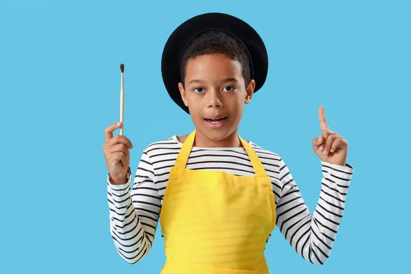 Little African American Boy Paint Brush Pointing Something Blue Background — Stock Photo, Image