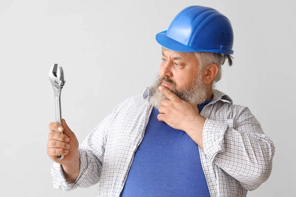Portrait Senior Man Hardhat Wrench Grey Background Labor Day Celebration — Stock Photo, Image