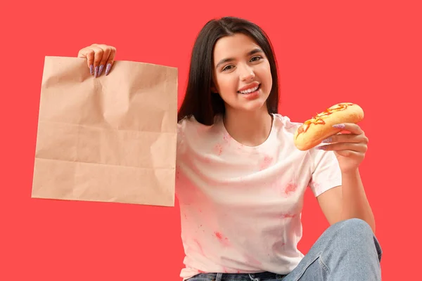 Pretty Young Woman Tasty Hot Dog Bag Red Background Food — Stock Photo, Image