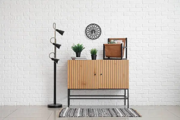Standard Lamp Wooden Cabinet Houseplants White Brick Wall — Stock Photo, Image