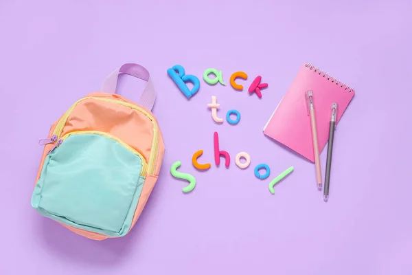 Text Back School Backpack Stationery Lilac Background — Stock Photo, Image