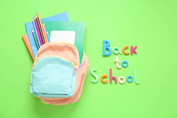 Text Back School Backpack Stationery Green Background — Stock Photo, Image