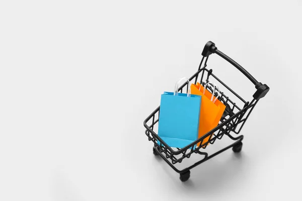 Small Shopping Cart Bags Grey Background — Stock Photo, Image