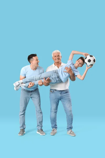 Little Boy His Dad Grandfather Holding Soccer Ball Blue Background — Stock Photo, Image