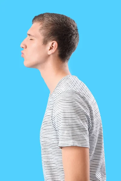 Young Man Blowing Kiss Blue Background — Stock Photo, Image